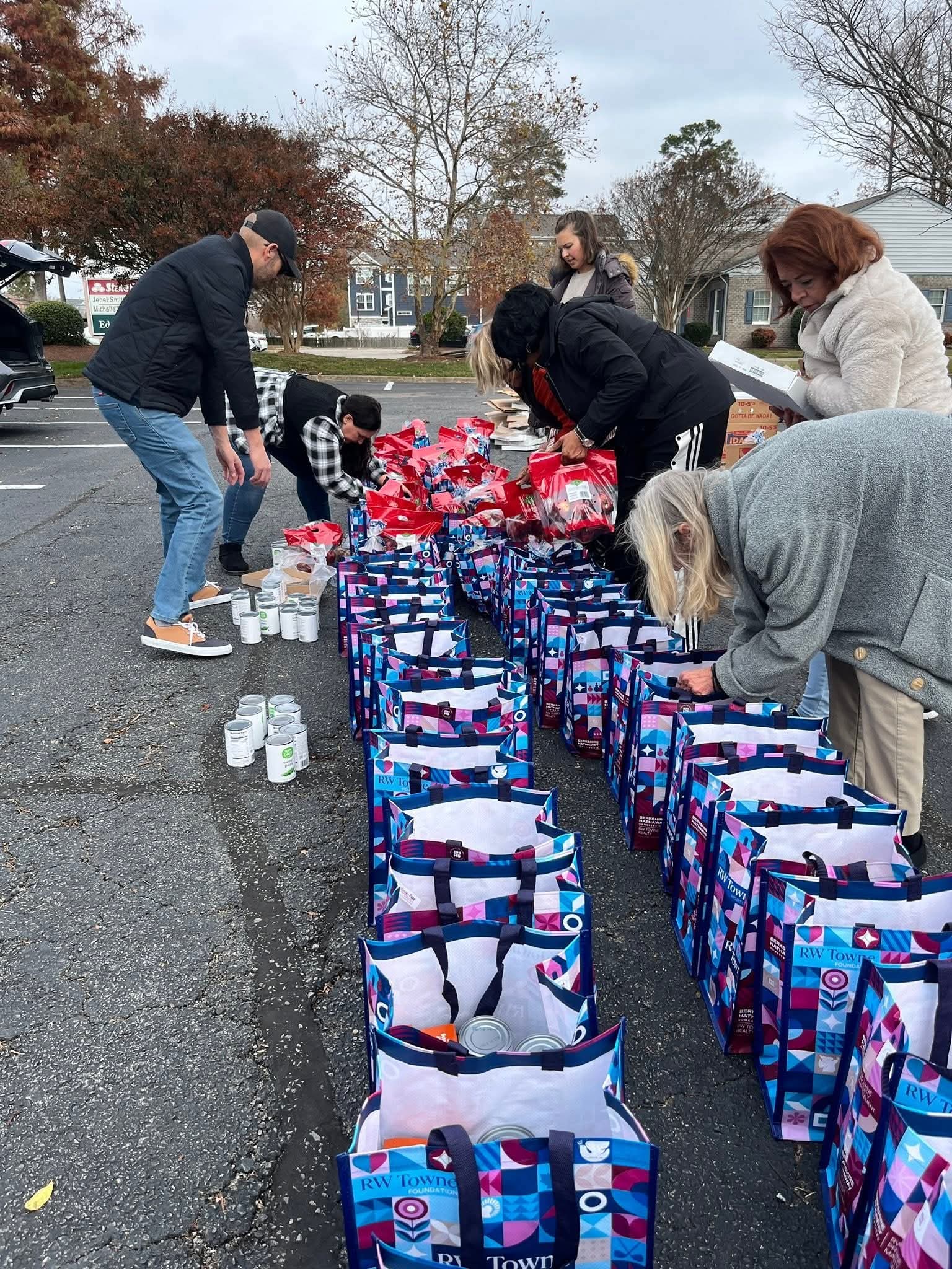Volunteers packing Thanksgiving meal bags for the Turkey Brigade