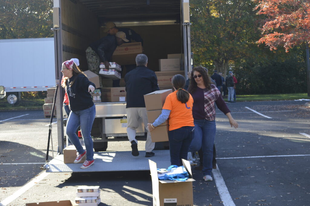 Volunteers unloading supplies