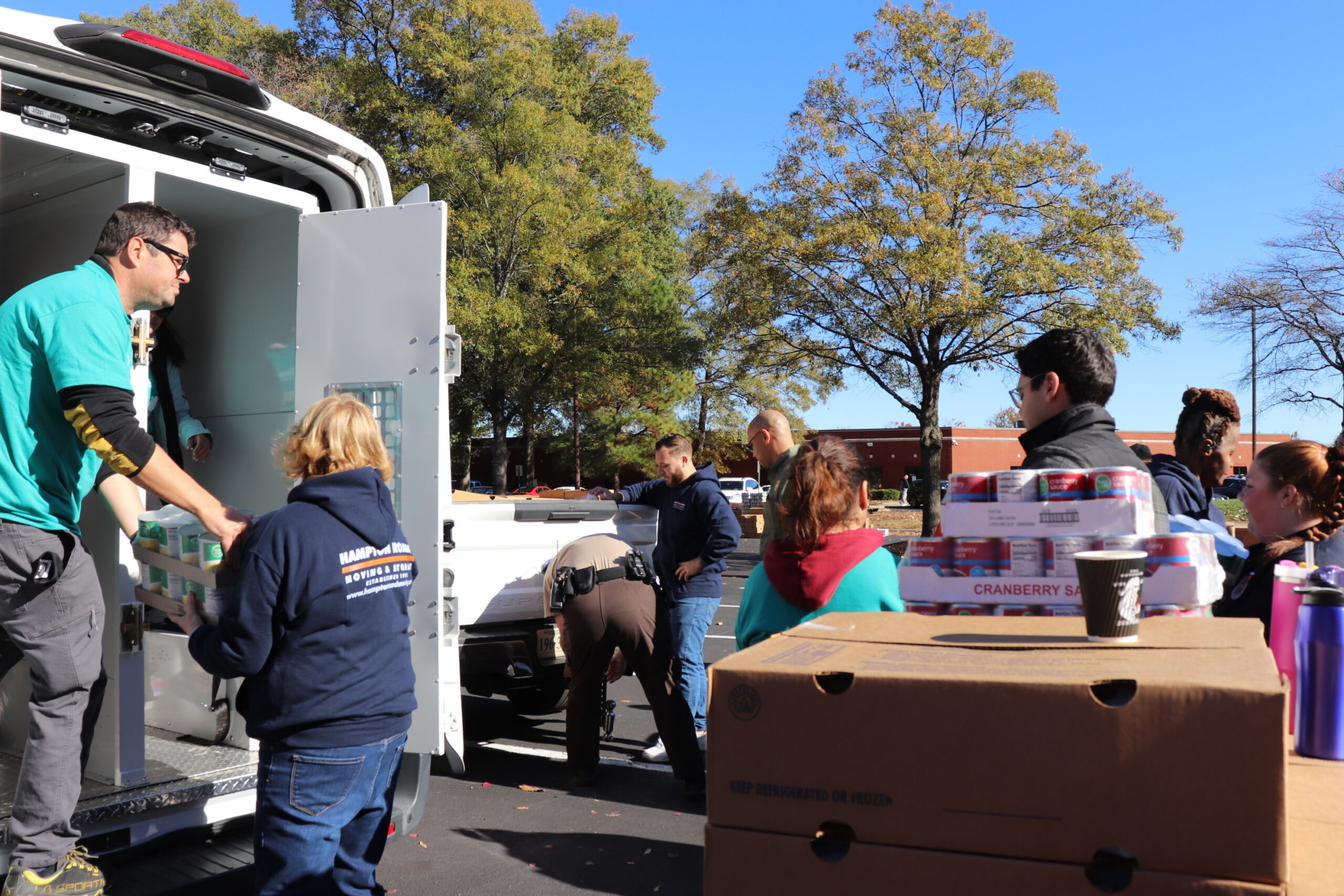 Volunteers loading boxes into a truck