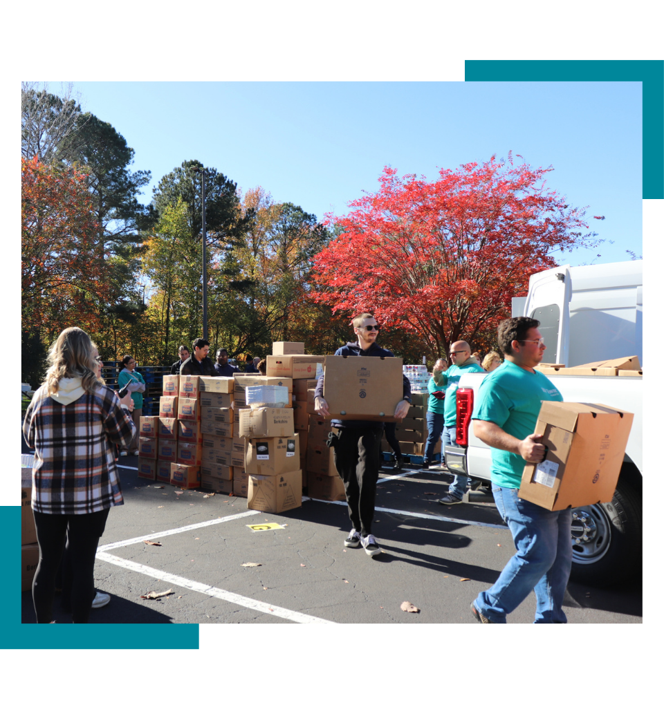 Volunteers carrying donated food at the Turkey Brigade